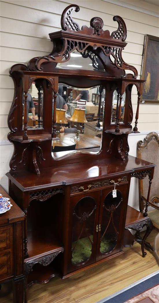 A late Victorian mahogany mirrored back side cabinet, W.136cm, D.38cm., H.234cm